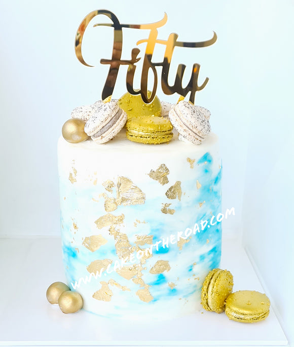 Gold Cake with Macarons